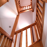 A finished staircase viewed from below